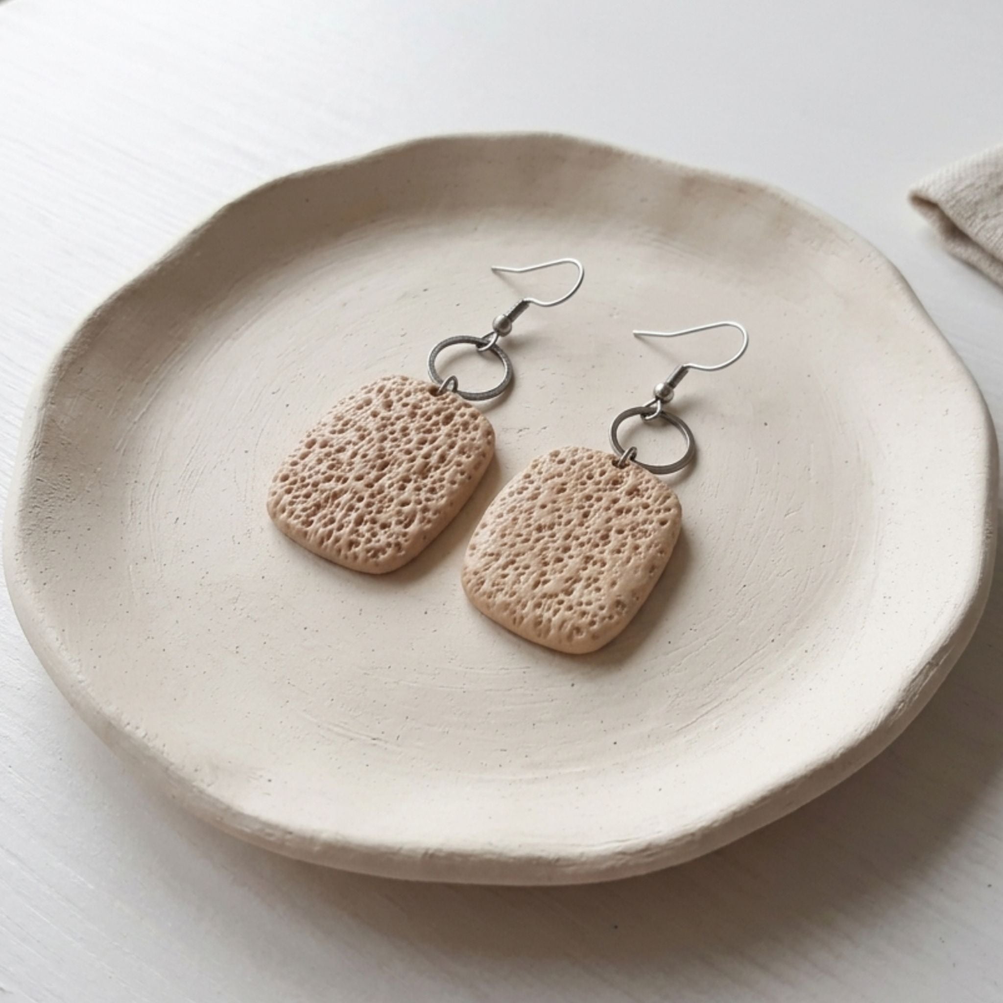 Natural beige textured polymer clay dangle earrings with stainless steel shepherd hooks
