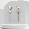 White freshwater pearl dangle earrings with stainless steel bar and hexagon stud
