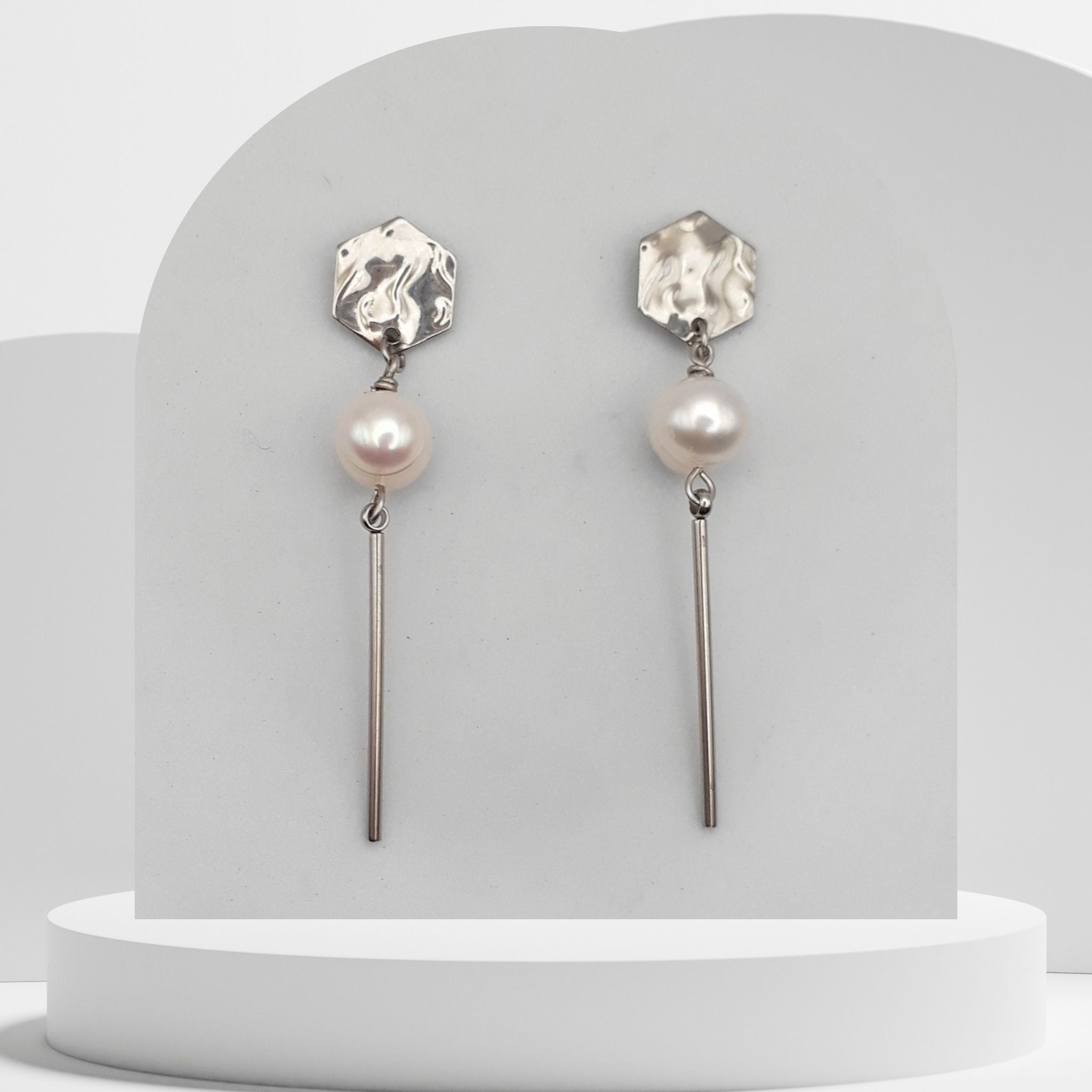 White freshwater pearl dangle earrings with stainless steel bar and hexagon stud