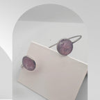 Handmade stainless steel open cuff bangle with crushed Pink Aura Quartz sealed in resin