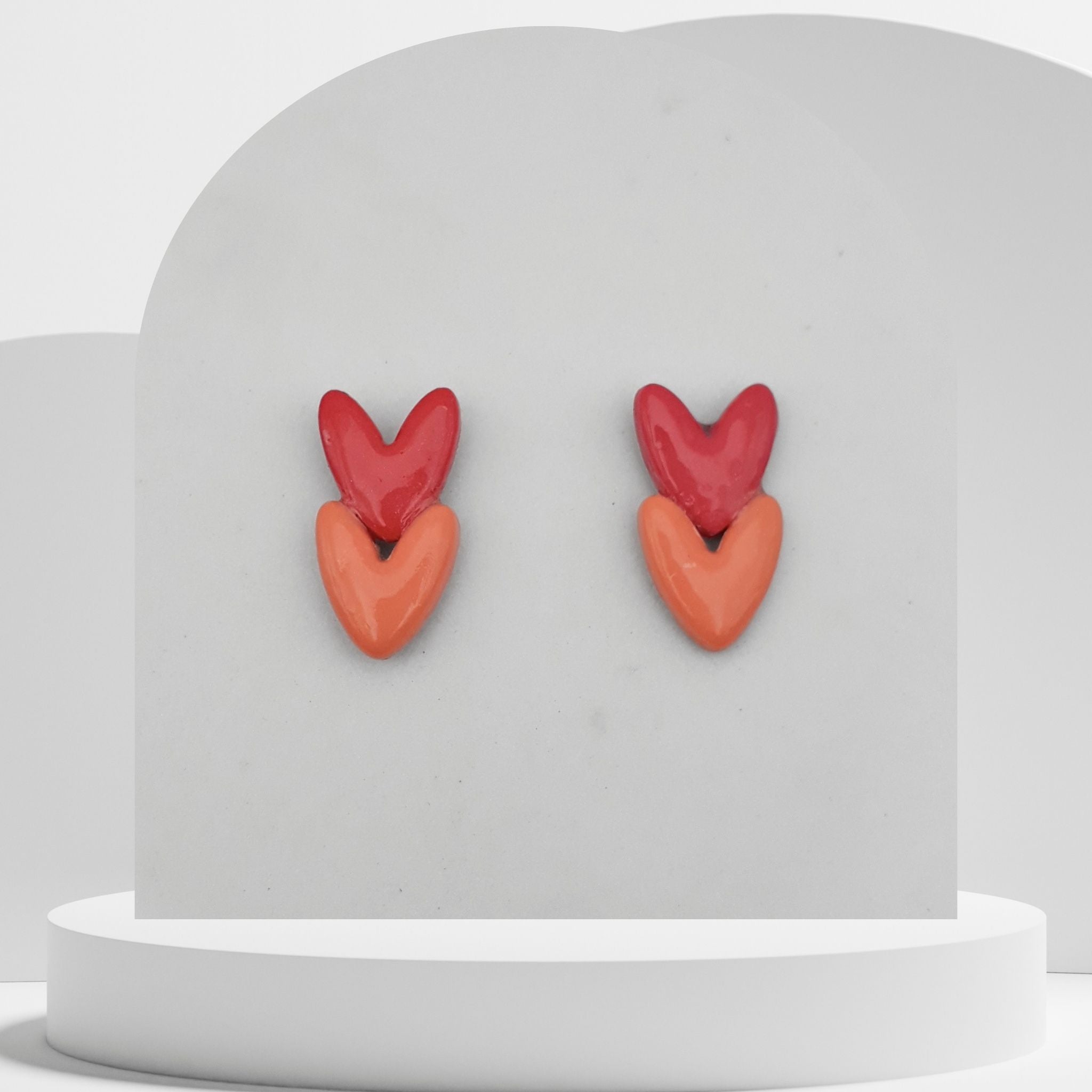 Pink double heart polymer clay stud earrings with stainless steel pins