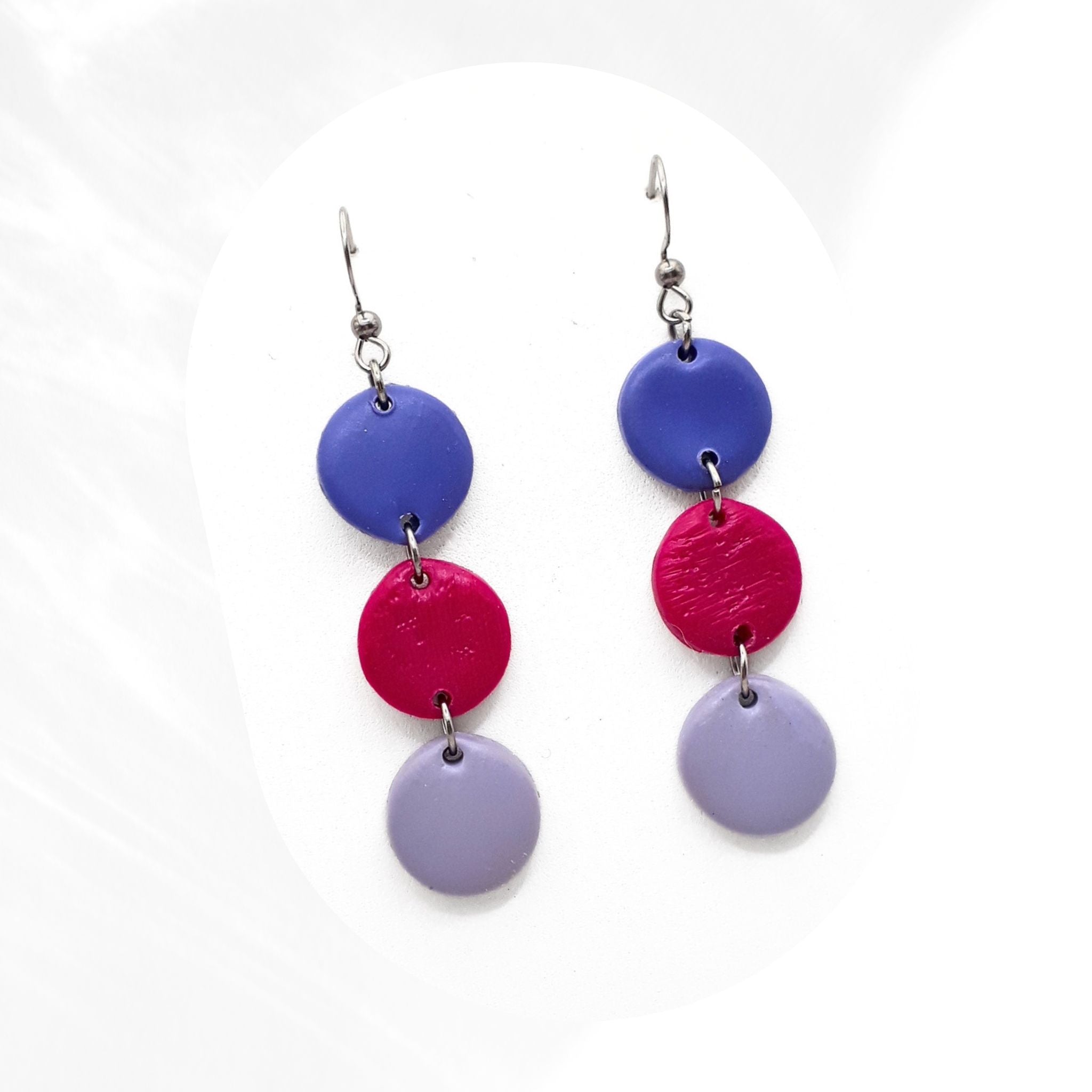 Handmade polymer clay drop earrings in purple and pink tones with stainless steel ear hooks, lightweight statement earrings