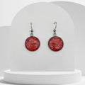 18mm stainless steel drop earrings with crushed natural red coral sealed in resin and finished with shepherd ear hooks