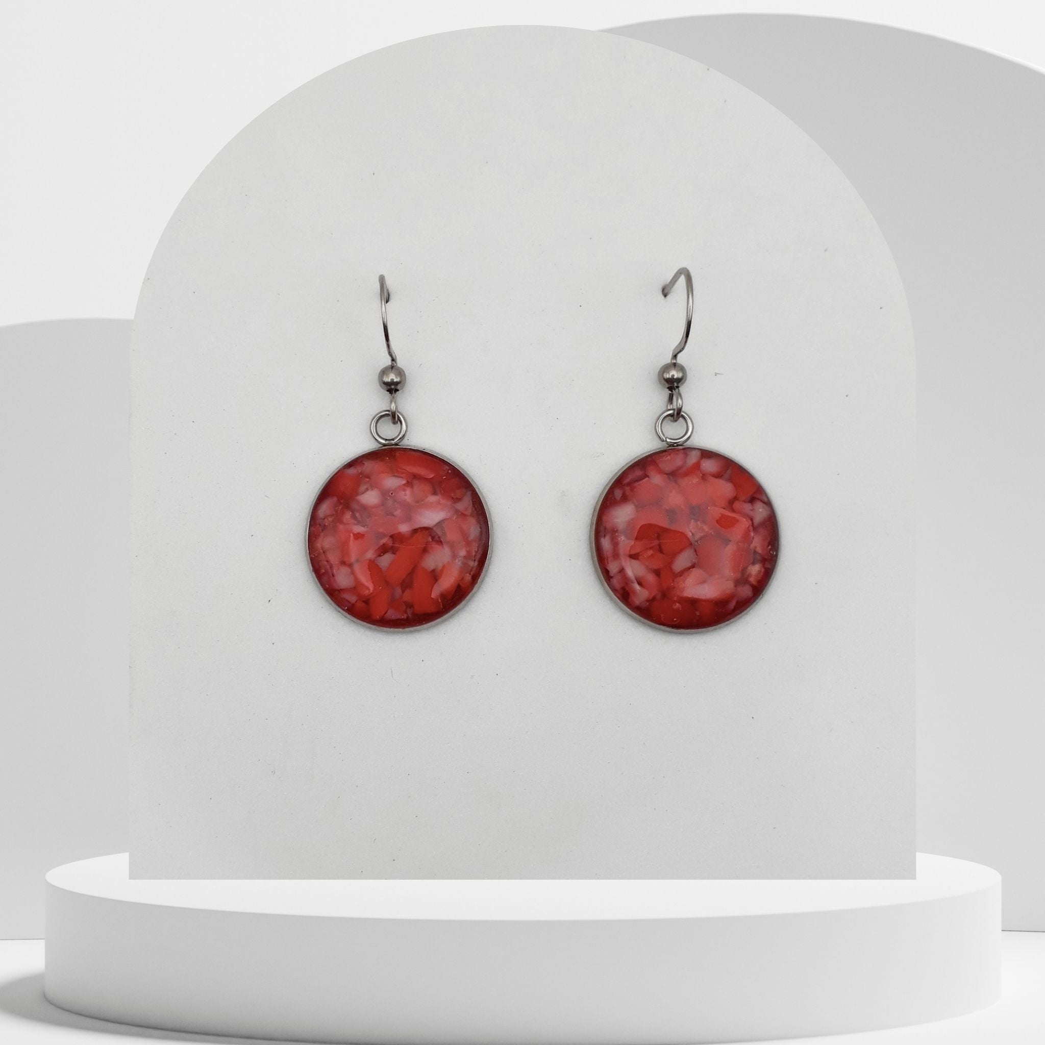 18mm stainless steel drop earrings with crushed natural red coral sealed in resin and finished with shepherd ear hooks