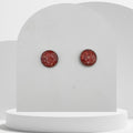 12mm stainless steel stud earrings with crushed natural red coral sealed in glossy resin bezel setting