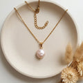 Soft pink 11mm coin freshwater pearl necklace with gold-plated stainless steel chain