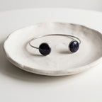 Handmade 304 stainless steel cuff bangle with natural crushed Star Stone 12mm bezel settings and clear resin finish.