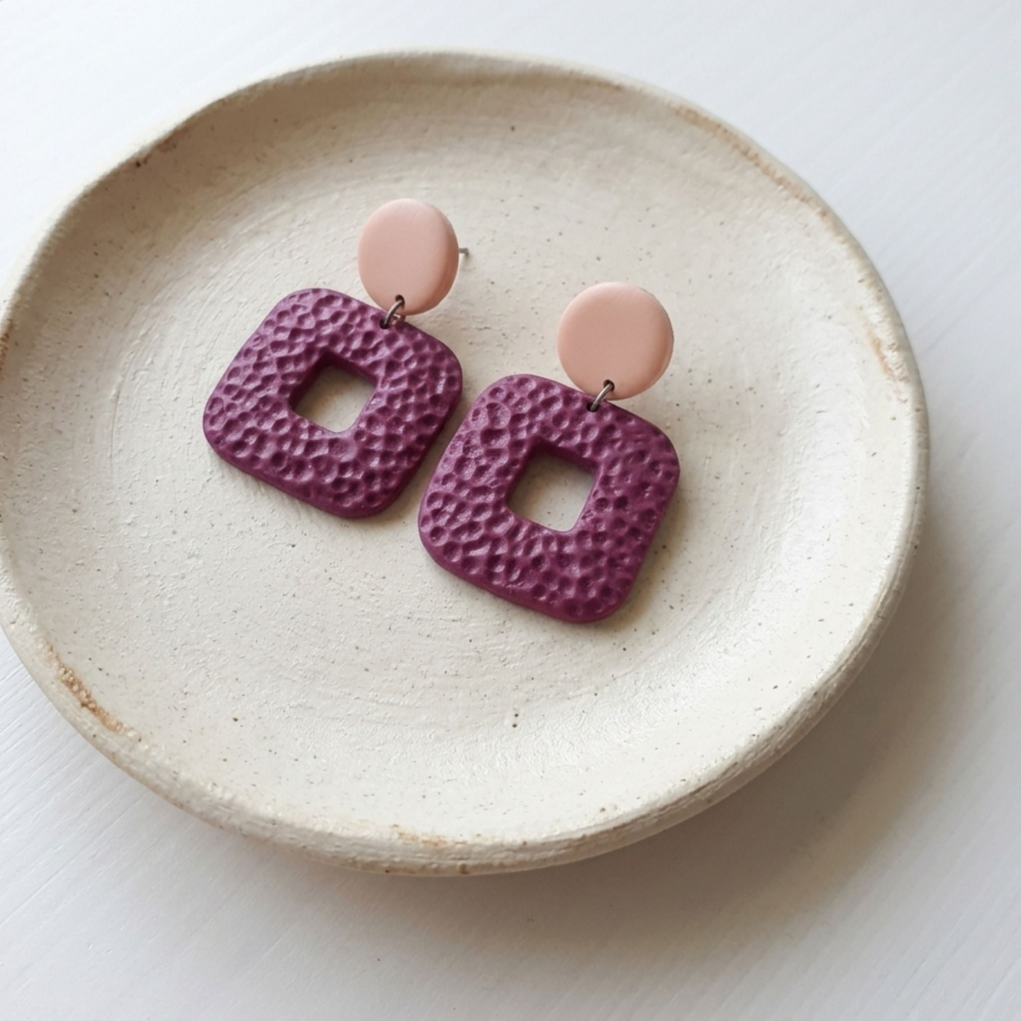 Textured purple polymer clay geometric statement earrings with blush pink studs