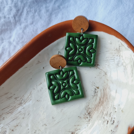 Experience love in every detail with our unique handmade square embossed polymer clay drop earrings. Adorned in a stunning green color