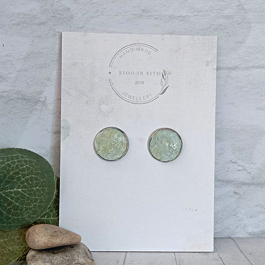 Elevate your style with our handmade Raw Andara Crystal 12 mm Ear Studs. These exquisite earrings feature genuine Andara crystals for a touch of natural beauty and mystique.