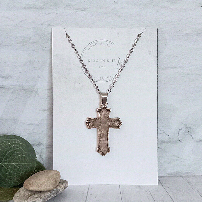 This Gorgeous Pink Aura Quartz Cross Necklace is made from natural Pink Aura Quartz Crystals. Unique Hand Crafted.