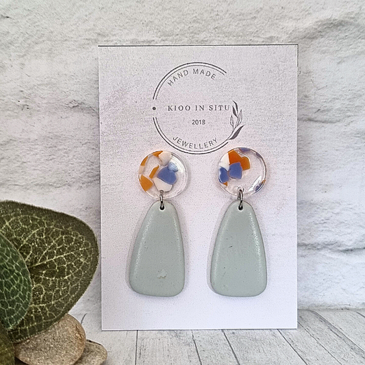 Add a unique touch to your outfit with these handmade and lightweight polymer clay earrings!