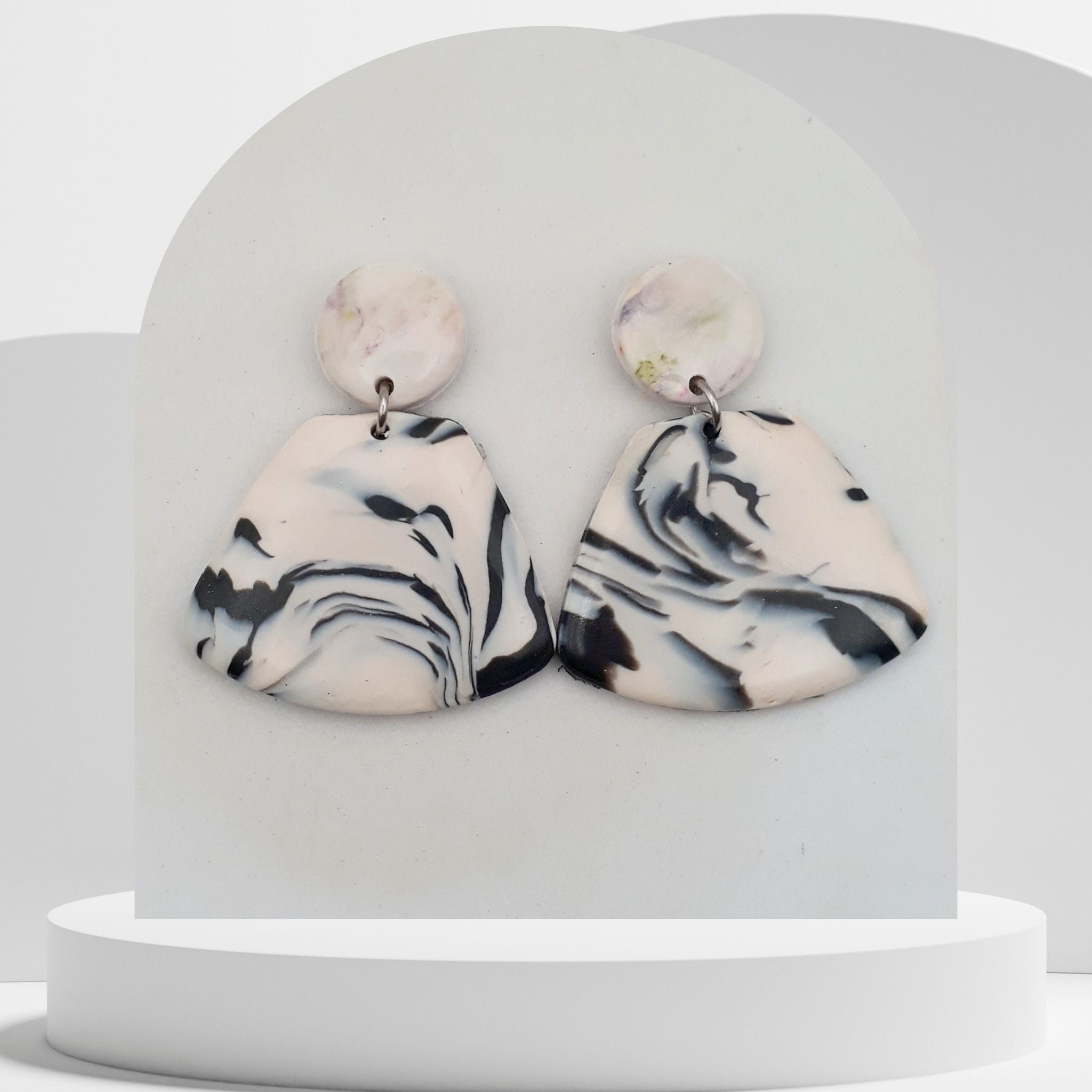 White and dark blue marble polymer clay triangle drop earrings with round stud tops