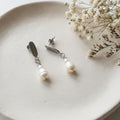White freshwater pearl drop earrings with 6mm natural pearl, rice pearl and 304 stainless steel oval studs