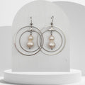 Handmade white freshwater pearl hoop earrings with double stainless steel hoop design