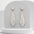 White polymer clay drop earrings with silver leaf and round stud tops