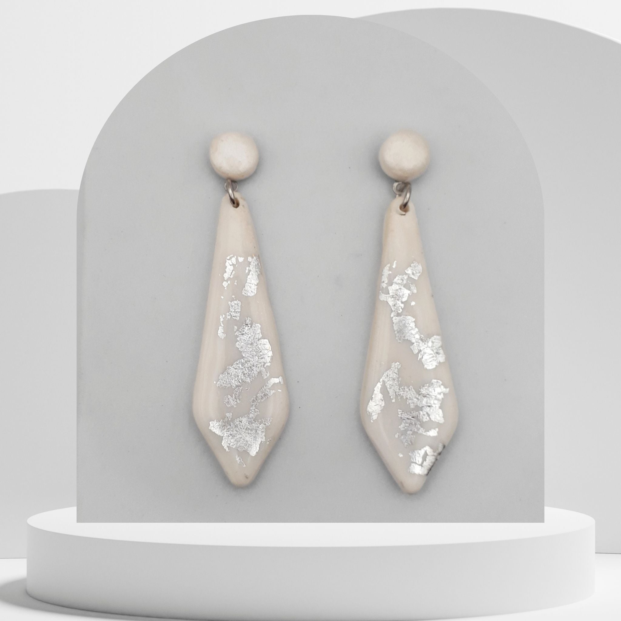 White polymer clay drop earrings with silver leaf and round stud tops