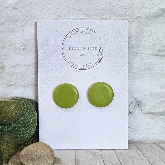Explore your style with these handmade Polymer Clay Ear Studs. Each 16 mm stud offers lightweight comfort and is available in a charming lime green color. 