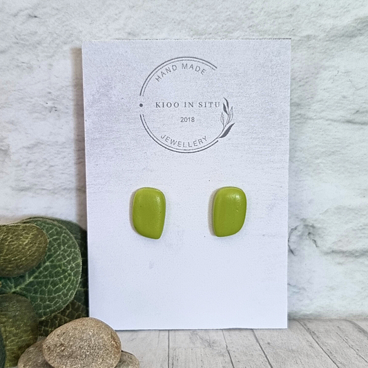Explore your style with these handmade Polymer Clay Ear Studs. Each stud offers lightweight comfort and is available in a charming lime color.