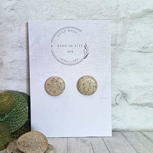 Explore your style with these handmade Polymer Clay Ear Studs. Each 14 mm stud offers lightweight comfort and is available in a charming cream color.